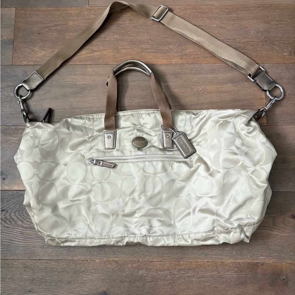 Coach gold weekender duffle bag